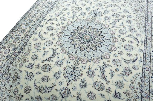 Backside of handmade 2000s Nain rug showing knot structure and weave density