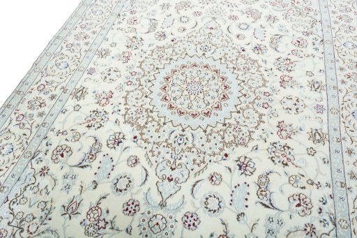 Backside of handmade 2000s Nain rug showing knot structure and weave density