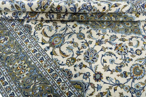 Close-up detail of 2000s Kashan rug from Iran / Persia showing Wool weave
