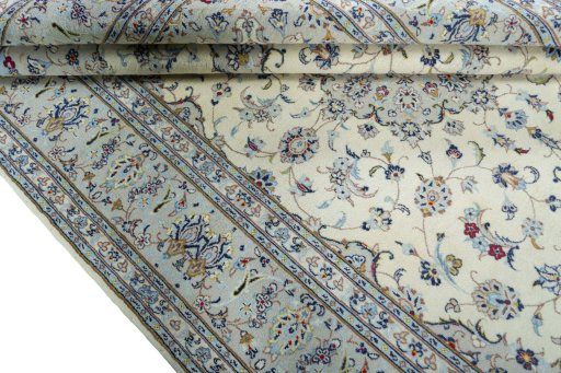 Close-up detail of 2000s Kashan rug from Iran / Persia showing Wool weave