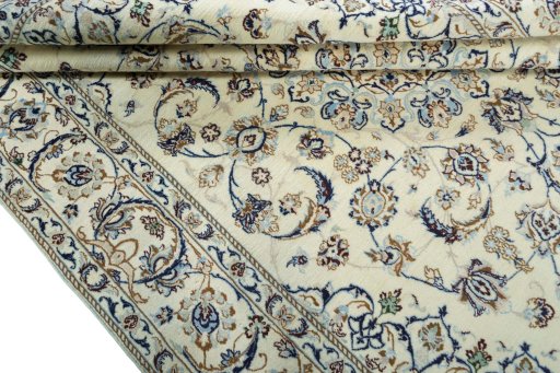 Close-up detail of 2000s Nain rug from Iran / Persia showing Wool weave