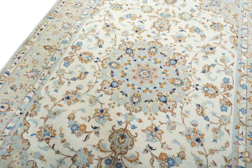 Backside of handmade New Kashan rug showing knot structure and weave density