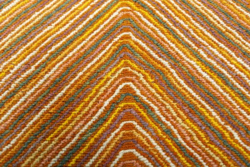 Backside of handmade New Kilim Dastan rug showing knot structure and weave density