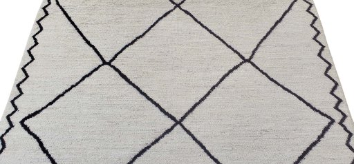 Backside of handmade New Morocco rug showing knot structure and weave density