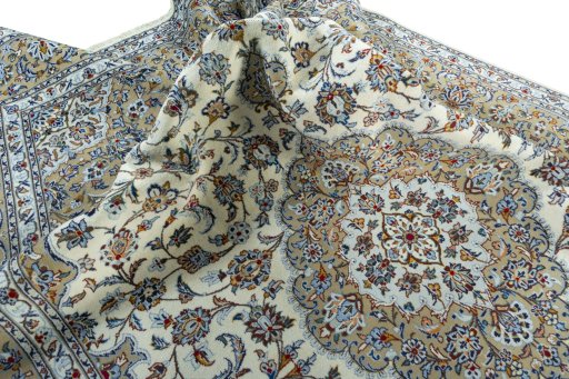 Surface texture of 2000s Kashan rug with natural Wool and intricate pattern