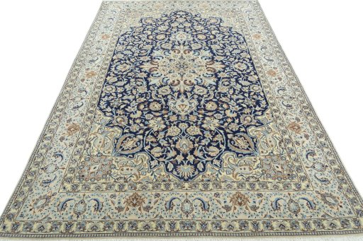Surface texture of 2000s Nain rug with natural Wool and intricate pattern