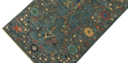 Backside of handmade New Farahan rug showing knot structure and weave density