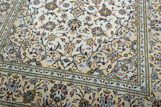 Close-up detail of 2000s Kashan rug from Iran / Persia showing Wool weave
