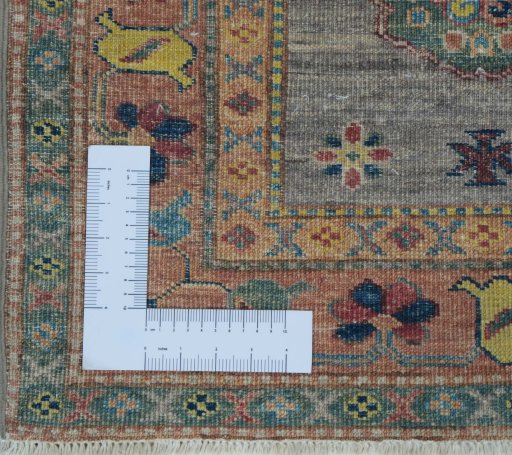 Corner detail of New Kazak rug showing border pattern and Wool pile