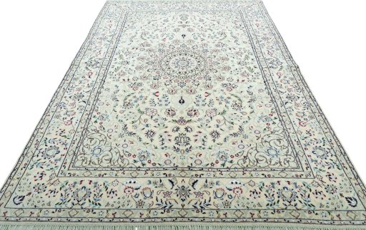 Surface texture of 2000s Nain rug with natural Wool and intricate pattern
