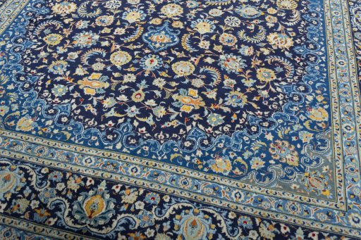 Close-up detail of 2000s Kashan rug from Iran / Persia showing Wool weave