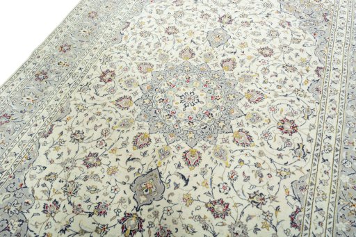 Backside of handmade New Kashan rug showing knot structure and weave density