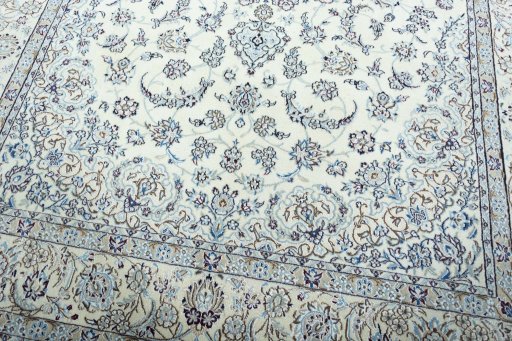 Close-up detail of 2000s Nain rug from Iran / Persia showing Wool weave