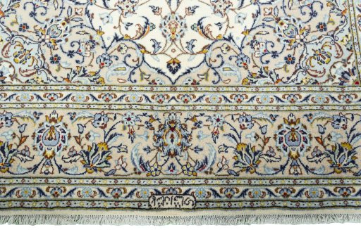 Close-up detail of 2000s Kashan rug from Iran / Persia showing Wool weave