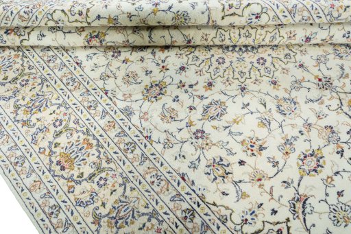 Close-up detail of 2000s Kashan rug from Iran / Persia showing Wool weave