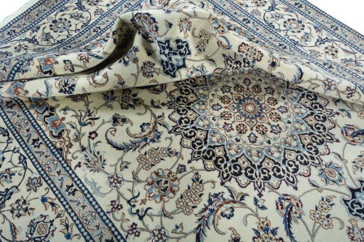 Surface texture of New Nain rug with natural Wool and intricate pattern
