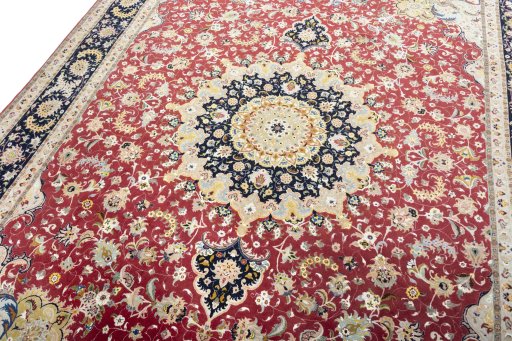 Backside of handmade 2000s Tabriz 50/60/70 Raj rug showing knot structure and weave density