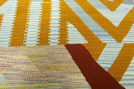 Backside of handmade New Kilim Dastan rug showing knot structure and weave density