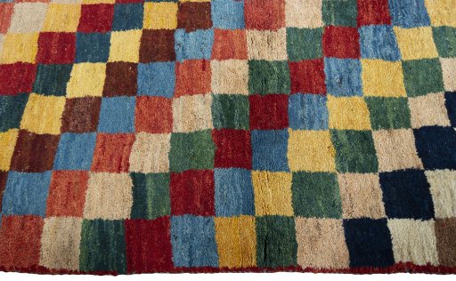 Close-up detail of 2000s Persian Gabbeh rug from Pakistan showing Wool weave