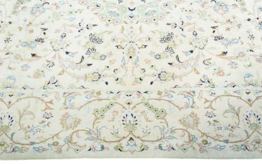 Corner detail of New Kashan rug showing border pattern and Wool pile