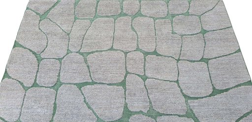 Backside of handmade New Morocco rug showing knot structure and weave density