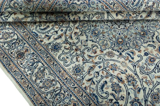 Close-up detail of 2000s Kashmar rug from Iran / Persia showing Wool weave