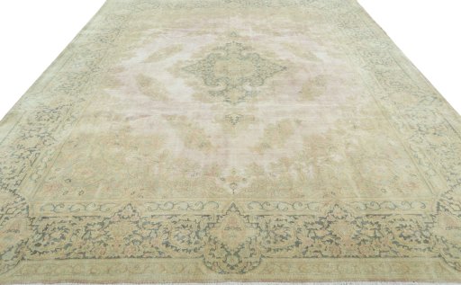 Surface texture of 1950s Vintage rug with natural Wool and intricate pattern