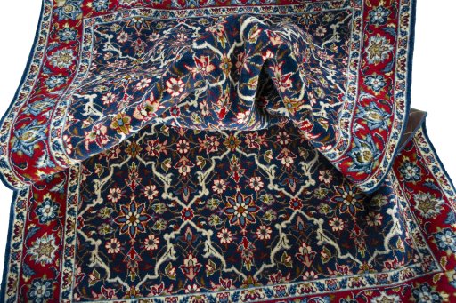 Corner detail of 2000s Najafabad rug showing border pattern and Wool pile