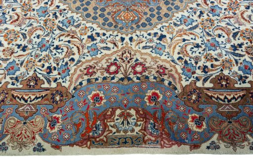 Corner detail of 2000s Kashmar rug showing border pattern and Wool pile