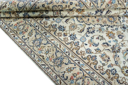 Close-up detail of 2000s Kashan rug from Iran / Persia showing Wool weave