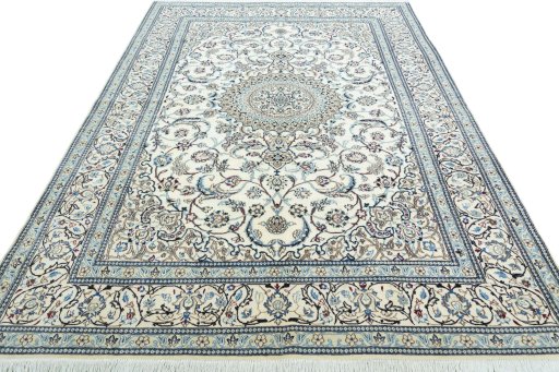 Surface texture of 2000s Nain rug with natural Wool and intricate pattern