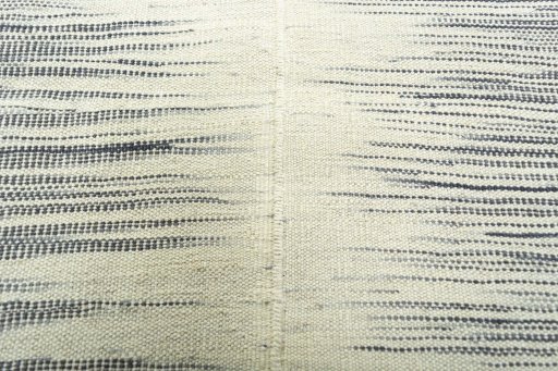 Backside of handmade New Kilim Kiasar rug showing knot structure and weave density