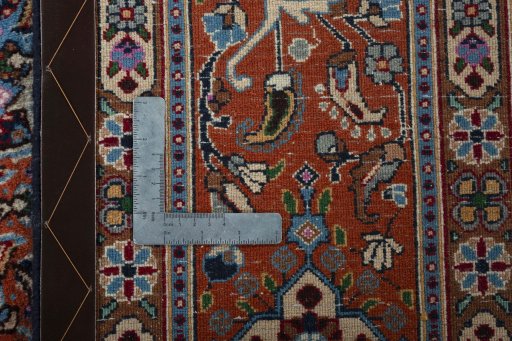 Backside of handmade 2000s Moud rug showing knot structure and weave density