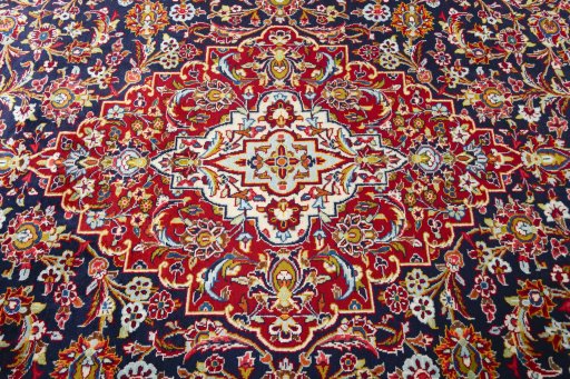 Central medallion detail of 2000s Kashan rug from Iran / Persia