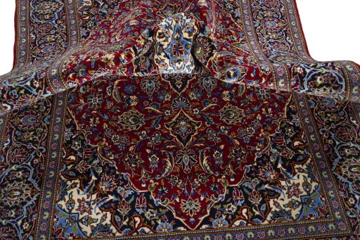 Surface texture of 2000s Kashan rug with natural Cork and intricate pattern
