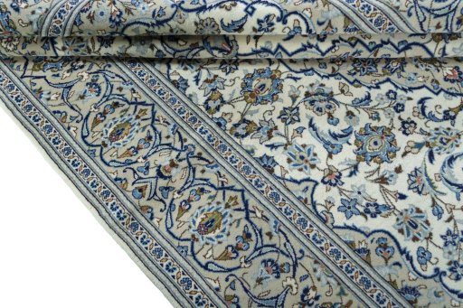 Close-up detail of 2000s Kashan rug from Iran / Persia showing Wool weave