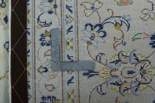 Surface texture of 2000s Kashan rug with natural Wool and intricate pattern