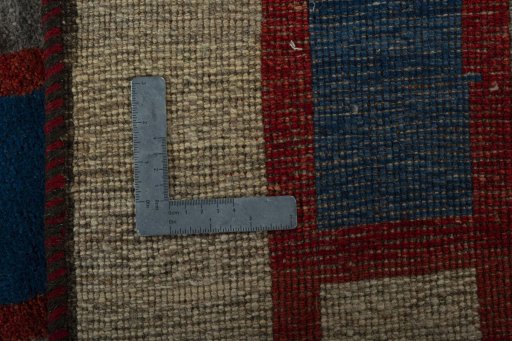 Close-up detail of 2000s Persian Gabbeh rug from Pakistan showing Wool weave