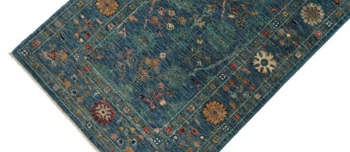 Backside of handmade New Farahan rug showing knot structure and weave density