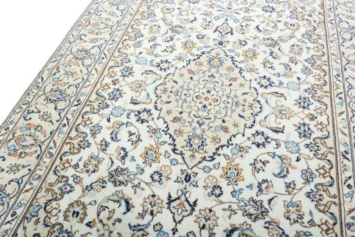 Backside of handmade 2000s Kashan rug showing knot structure and weave density