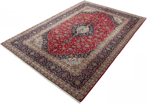 Corner detail of 2000s Kashan rug showing border pattern and Wool pile
