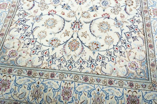 Close-up detail of 2000s Nain rug from Iran / Persia showing Wool weave