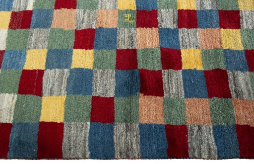 Close-up detail of 2000s Persian Gabbeh rug from Pakistan showing Wool weave