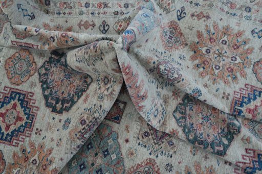 Full view of New Kazak rug from Pakistan, 371 × 272 cm in Beige tones