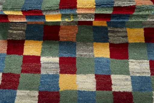Full view of 2000s Persian Gabbeh rug from Pakistan, 153 × 113 cm in Multi Color tones