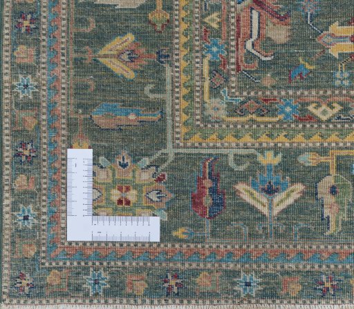 Corner detail of New Kazak rug showing border pattern and Wool pile