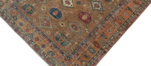 Backside of handmade New Kazak rug showing knot structure and weave density