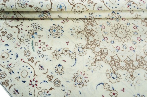 Close-up detail of 2000s Nain rug from Iran / Persia showing Wool weave