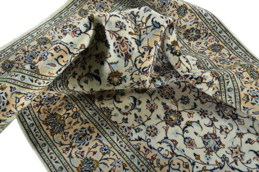 Surface texture of 2000s Kashan rug with natural Wool and intricate pattern