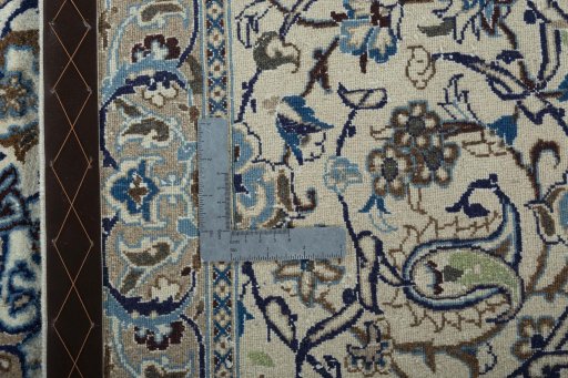 Backside of handmade 2000s Nain rug showing knot structure and weave density